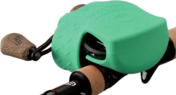 Green fishing reel cover on a fishing reel with cork handle