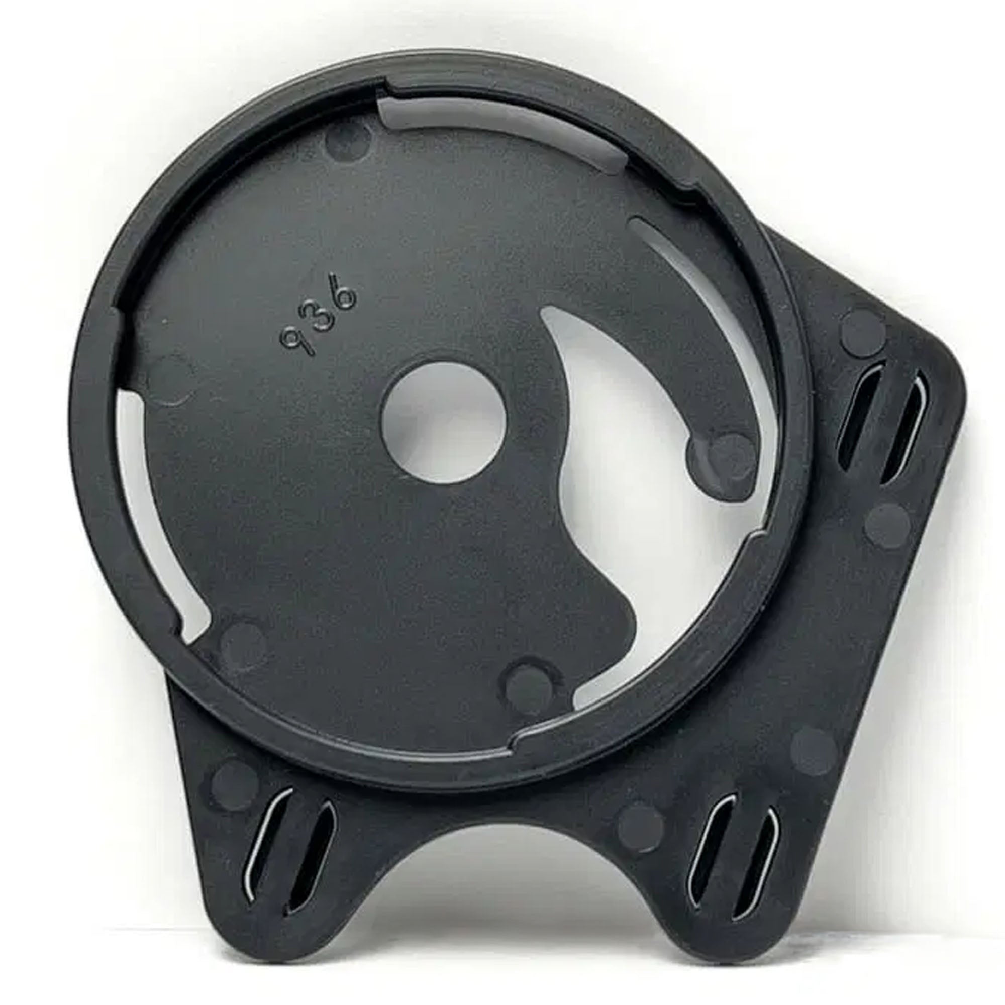 Black metal component with a yin-yang symbol on a white background