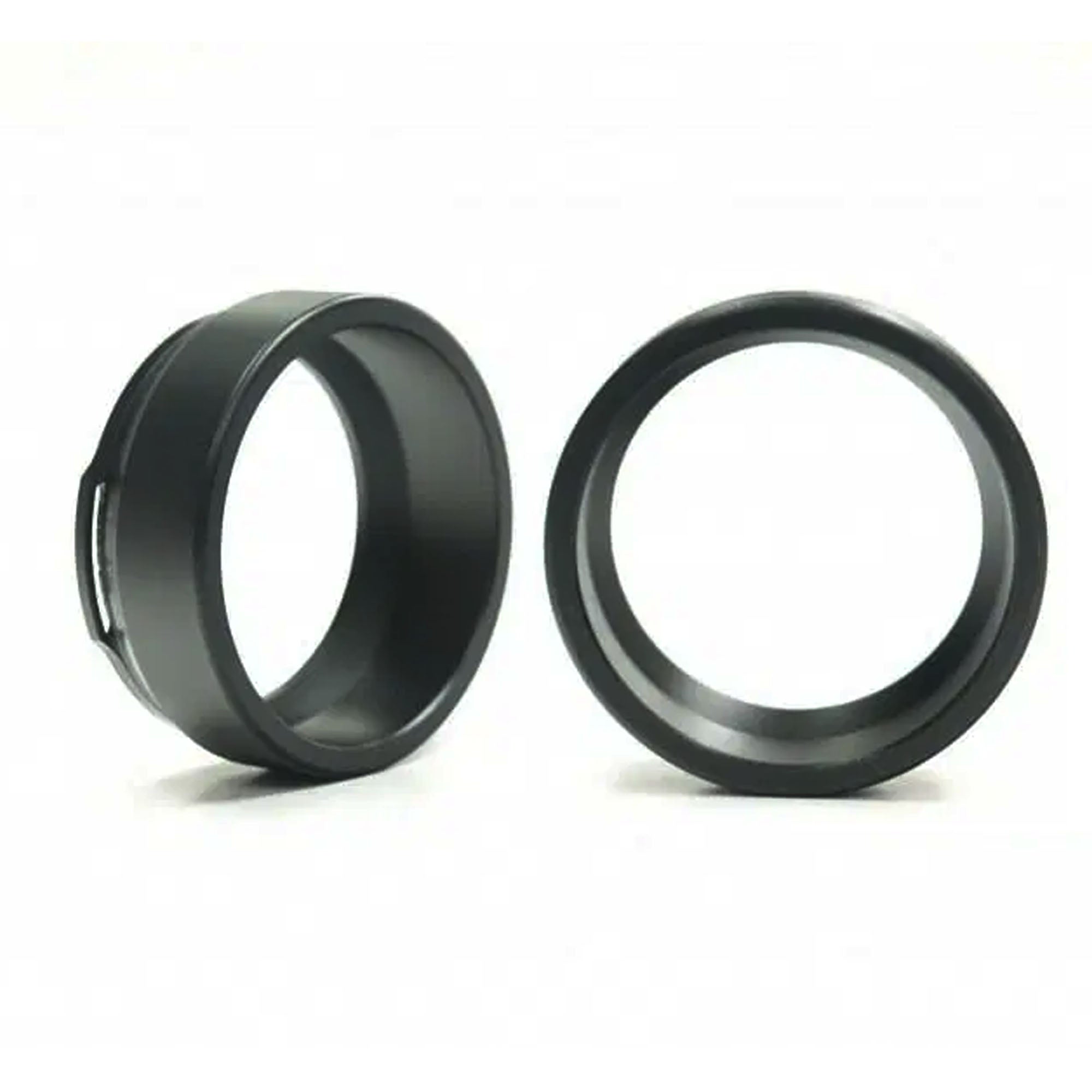 Two black rubber seals on a white background
