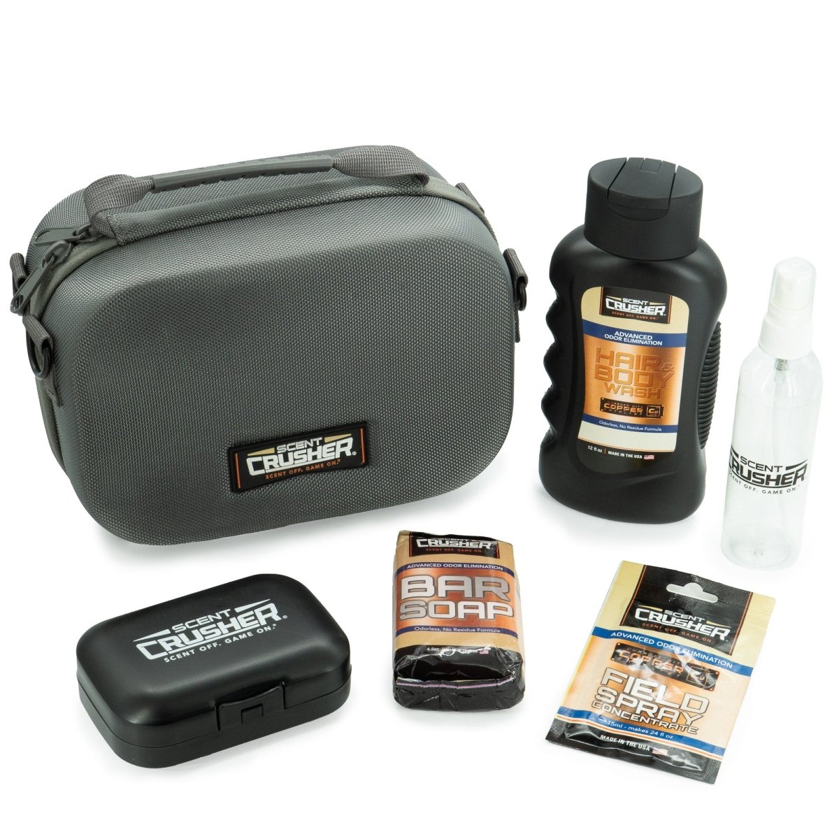 Scent Crusher travel kit set including a gray carrying case, bar of soap, and other items on a white background.