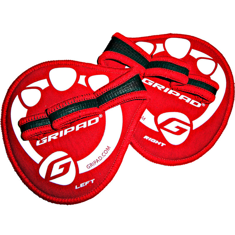 Red grip pads with black straps and 'Gripad' branding on a white background
