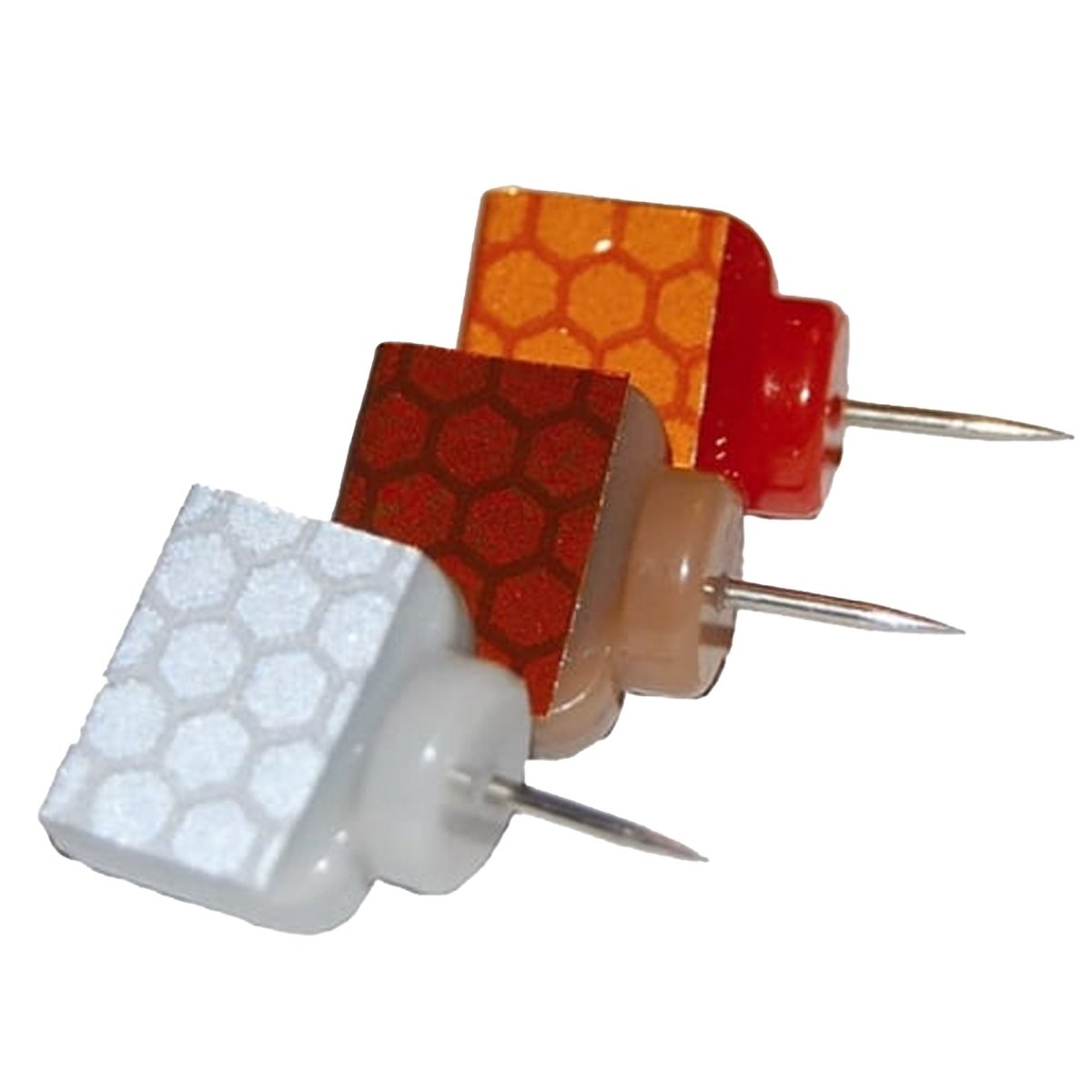 Set of four decorative reflective wing tacks with different colored and textured heads on a white background.