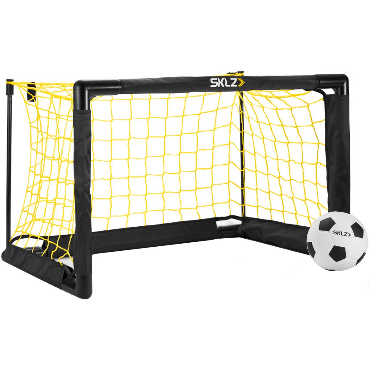 Mini soccer goal with yellow net and black frame, accompanied by a soccer ball, on a white background. Brand 'SKLZ' visible.