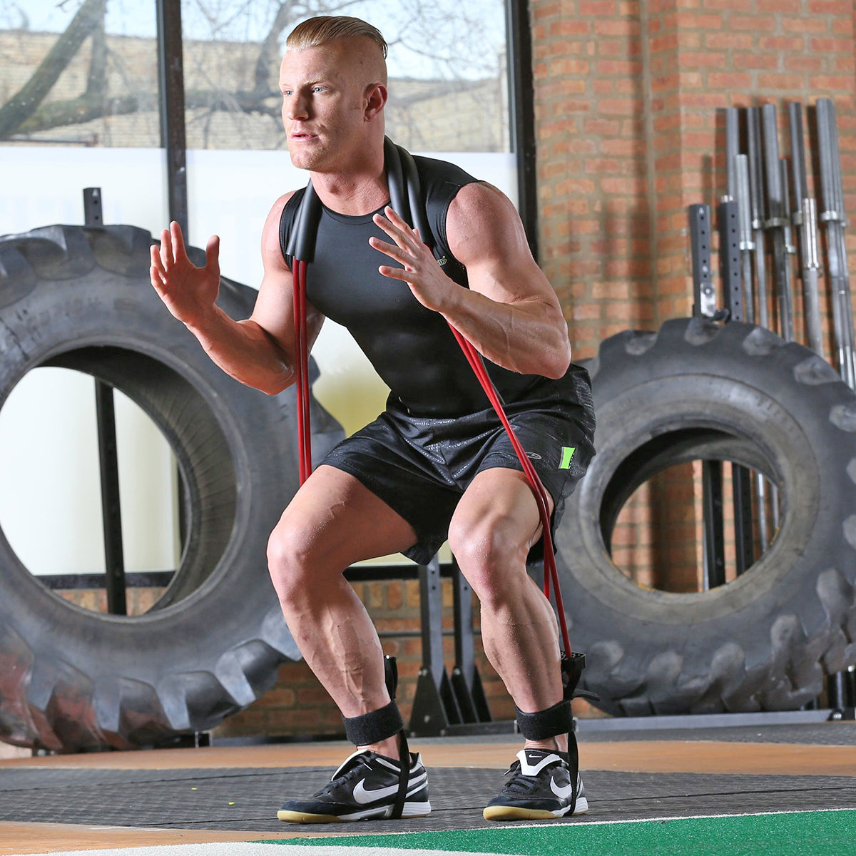 Man exercising with Lifeline USA Portable Power Jumper with Resistance Cables