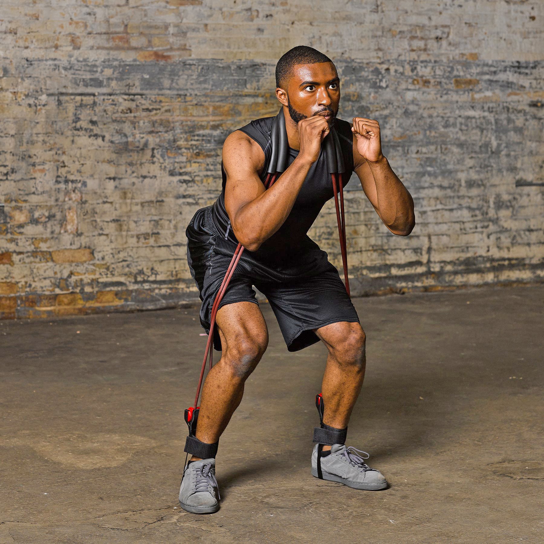 Man exercising with Lifeline USA Portable Power Jumper with Resistance Cables - Forza Sports