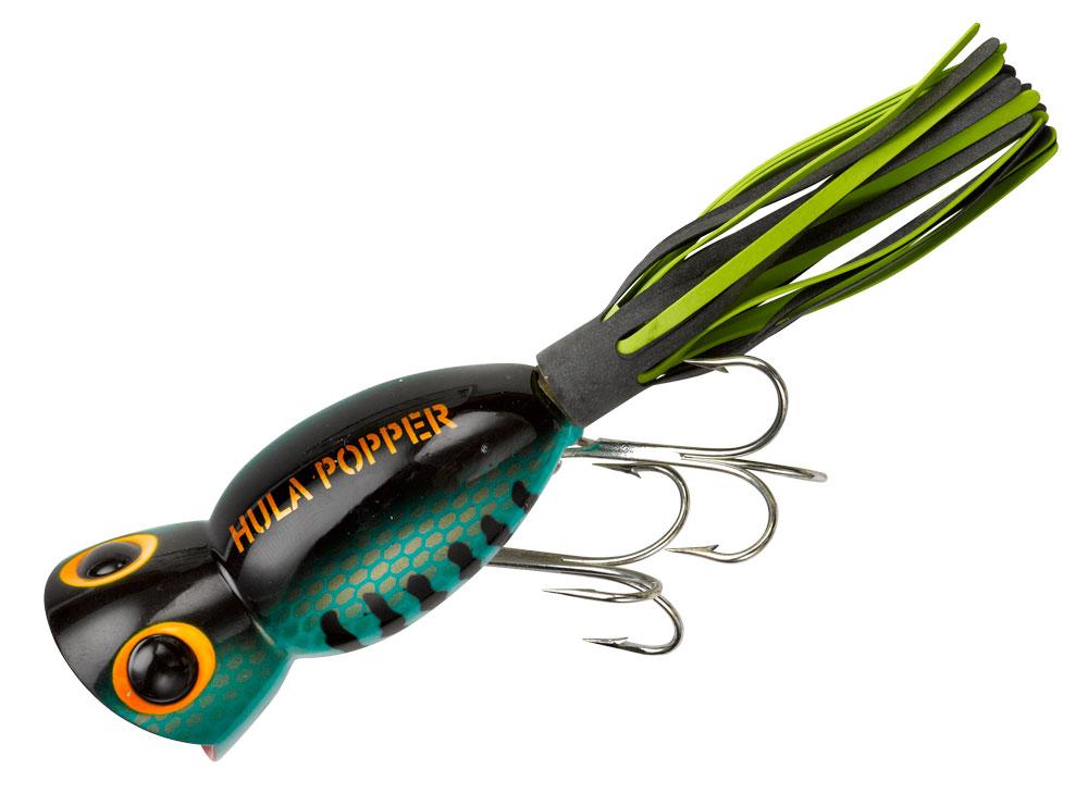 Fishing lure with green and black details on a white background