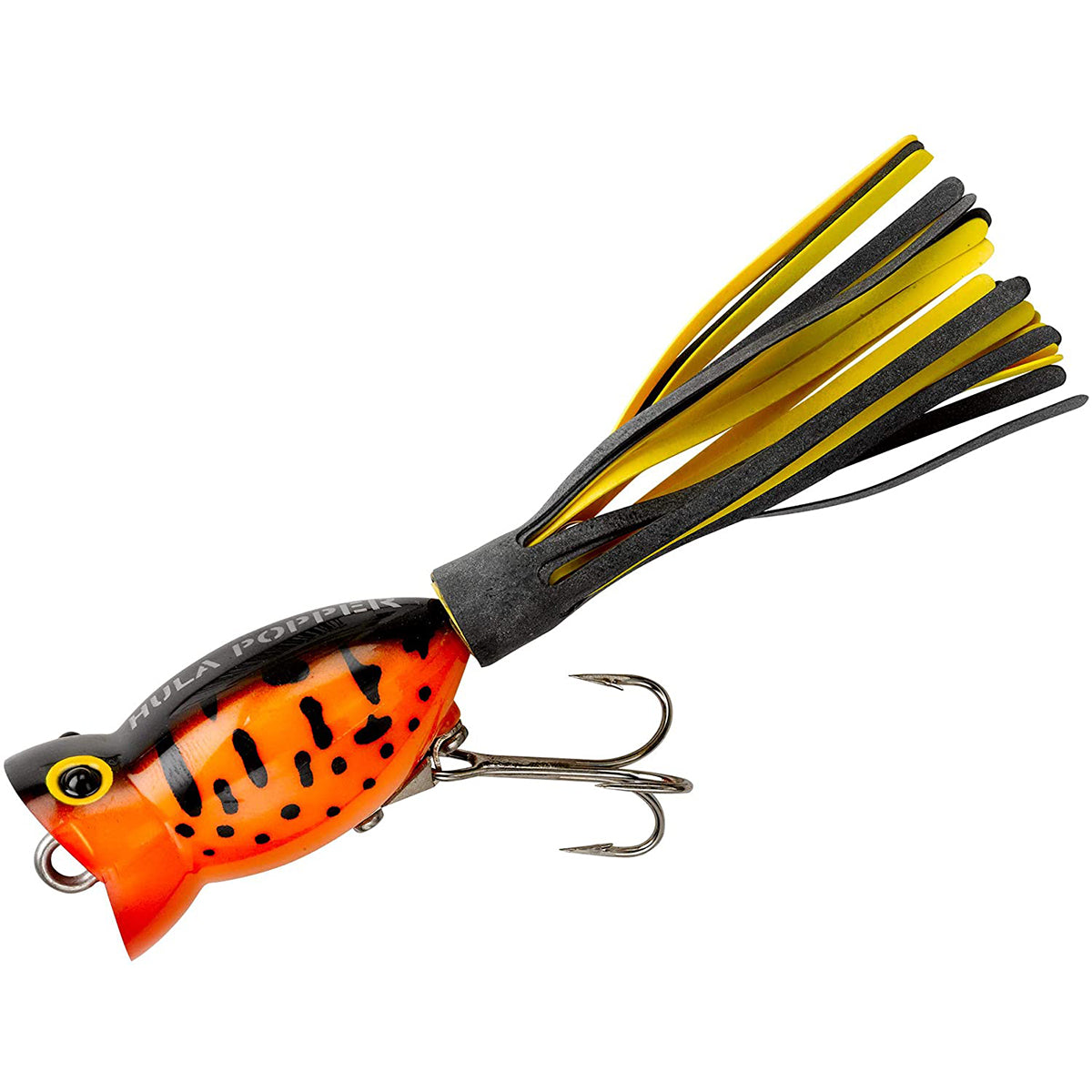 Fishing lure with orange body, black spots, and yellow and black skirt on a white background