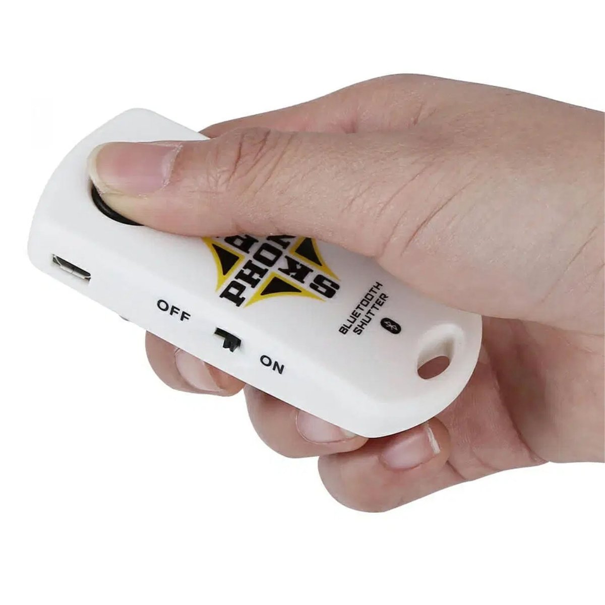Hand holding a white bluetooth shutter button with 'Black Rock' branding on a white background