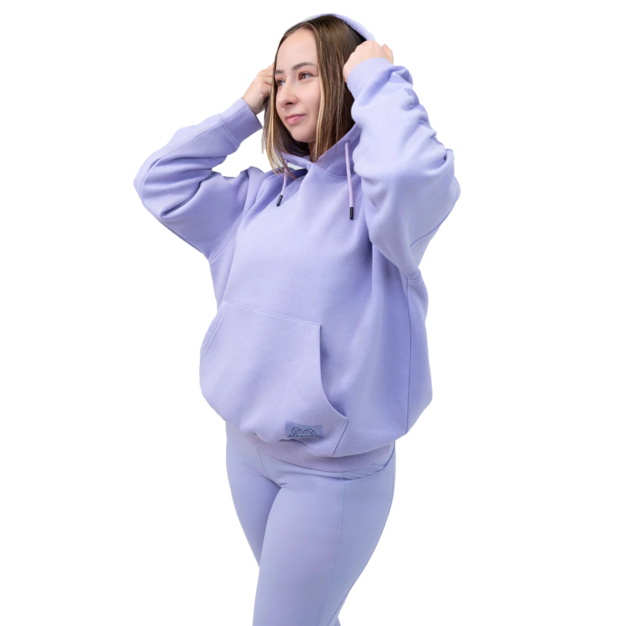 Person wearing a light purple heavyweight fleece hoodie and pants on a white background