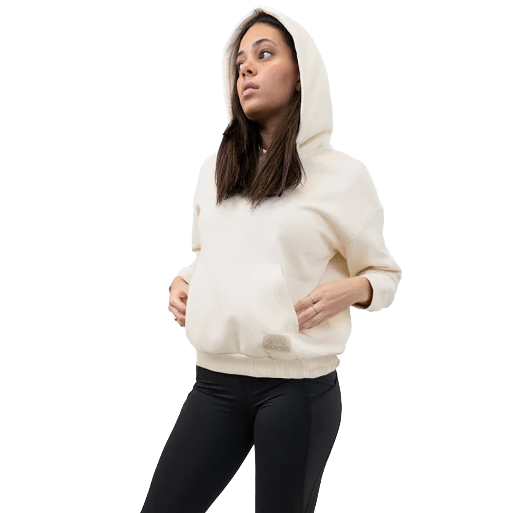 Woman wearing a white heavyweight fleece hoodie and black pants on a white background