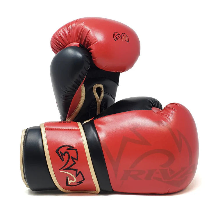 Red and black boxing gloves with a brand logo on a white background