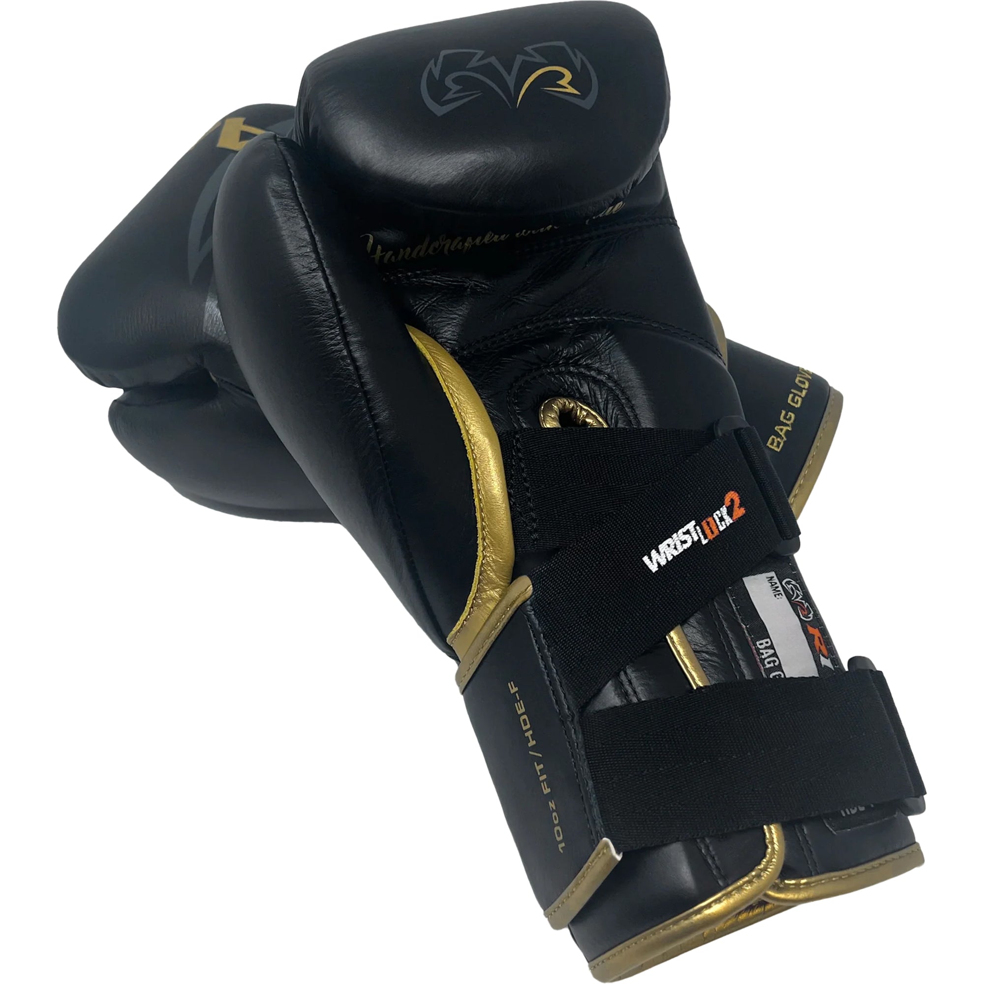 Black and gold boxing glove with visible branding on a white background
