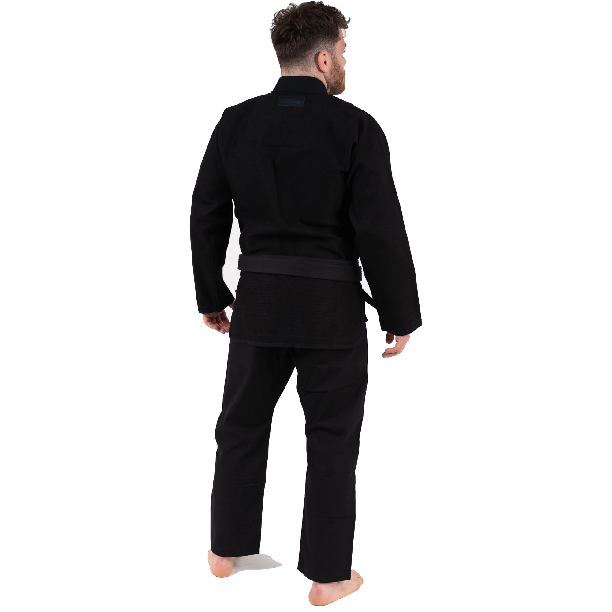 Person wearing a black martial arts uniform on a white background
