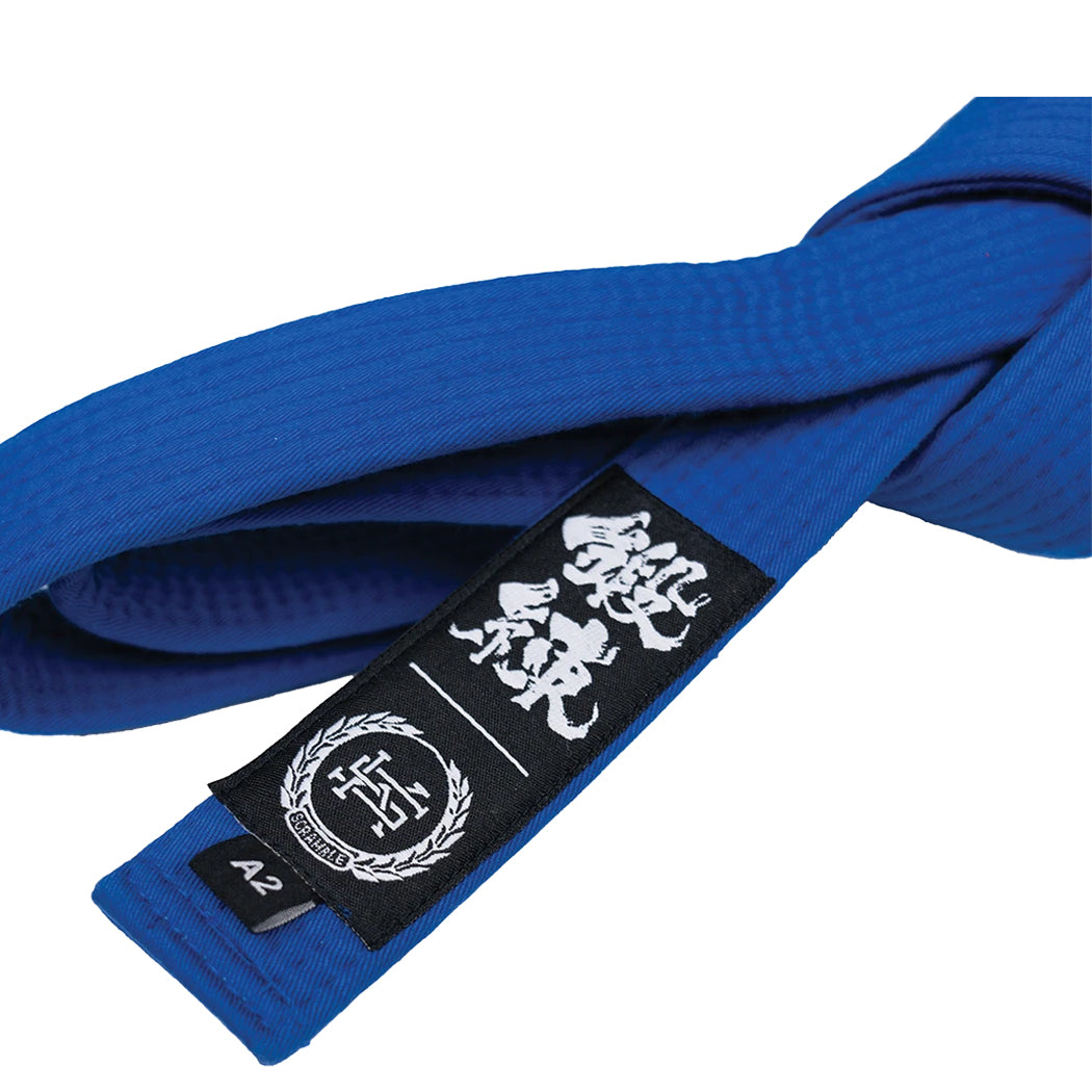 Blue martial arts belt with a black belt patch on a white background