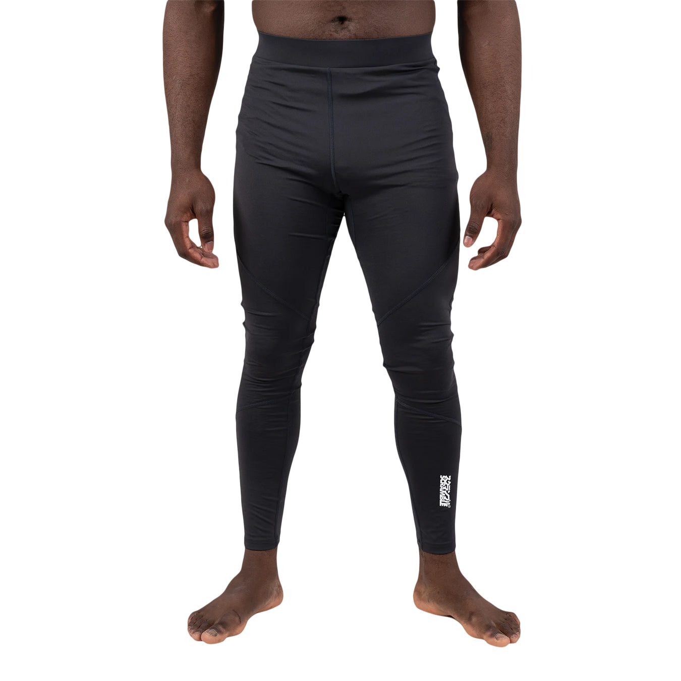 Black compression pants worn by a person on a white background