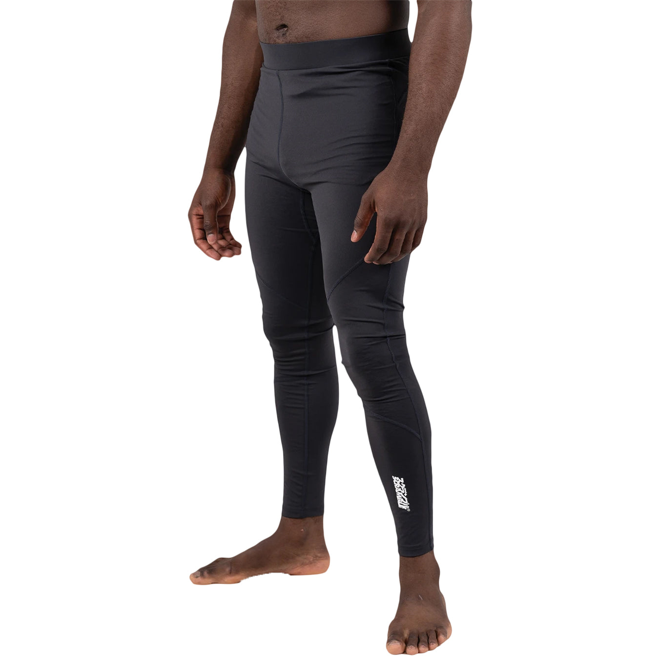 Person wearing black compression leggings with a visible brand logo on a white background
