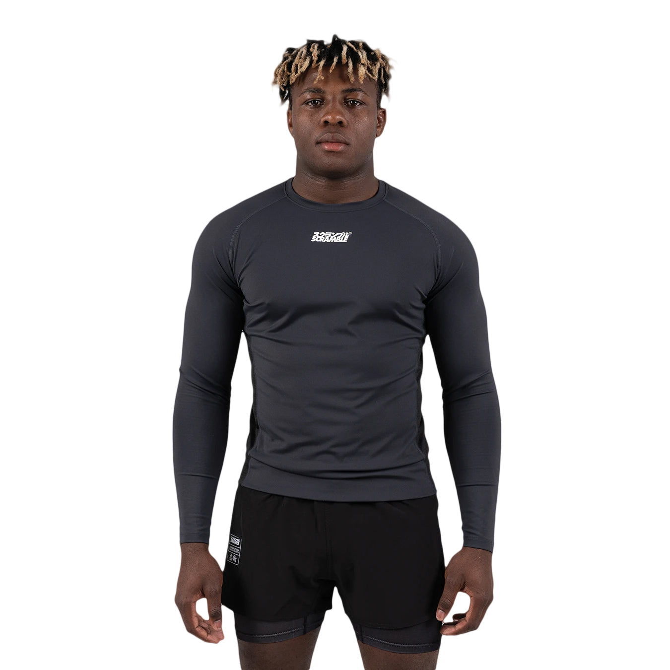 Person wearing a black long-sleeve athletic shirt with a visible brand logo on a white background
