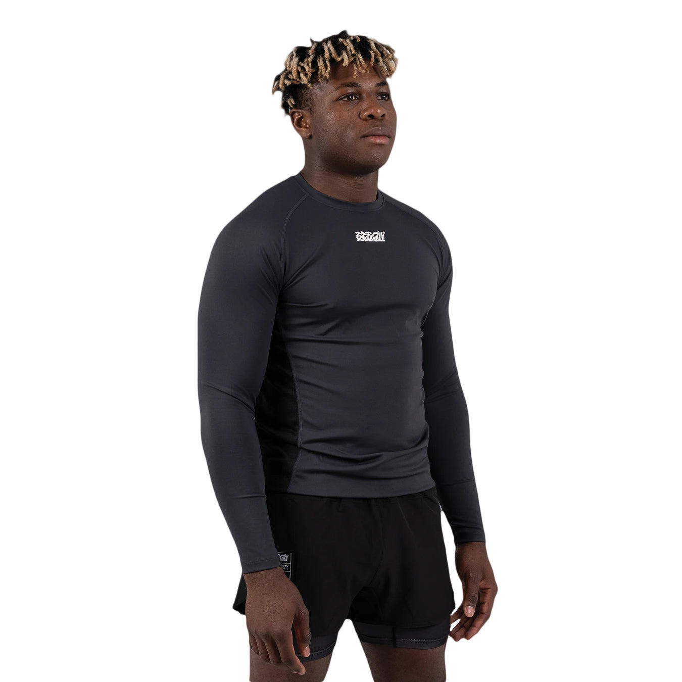 Person wearing a black long-sleeve athletic shirt with a logo on a white background