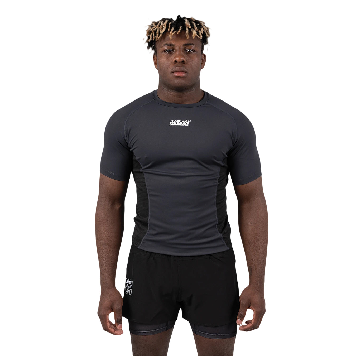 Person wearing a black athletic outfit with a logo on a white background