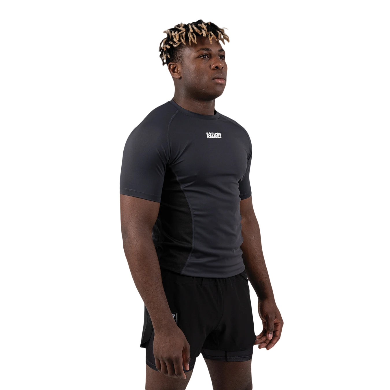 Person wearing a black athletic outfit with a brand logo on a white background