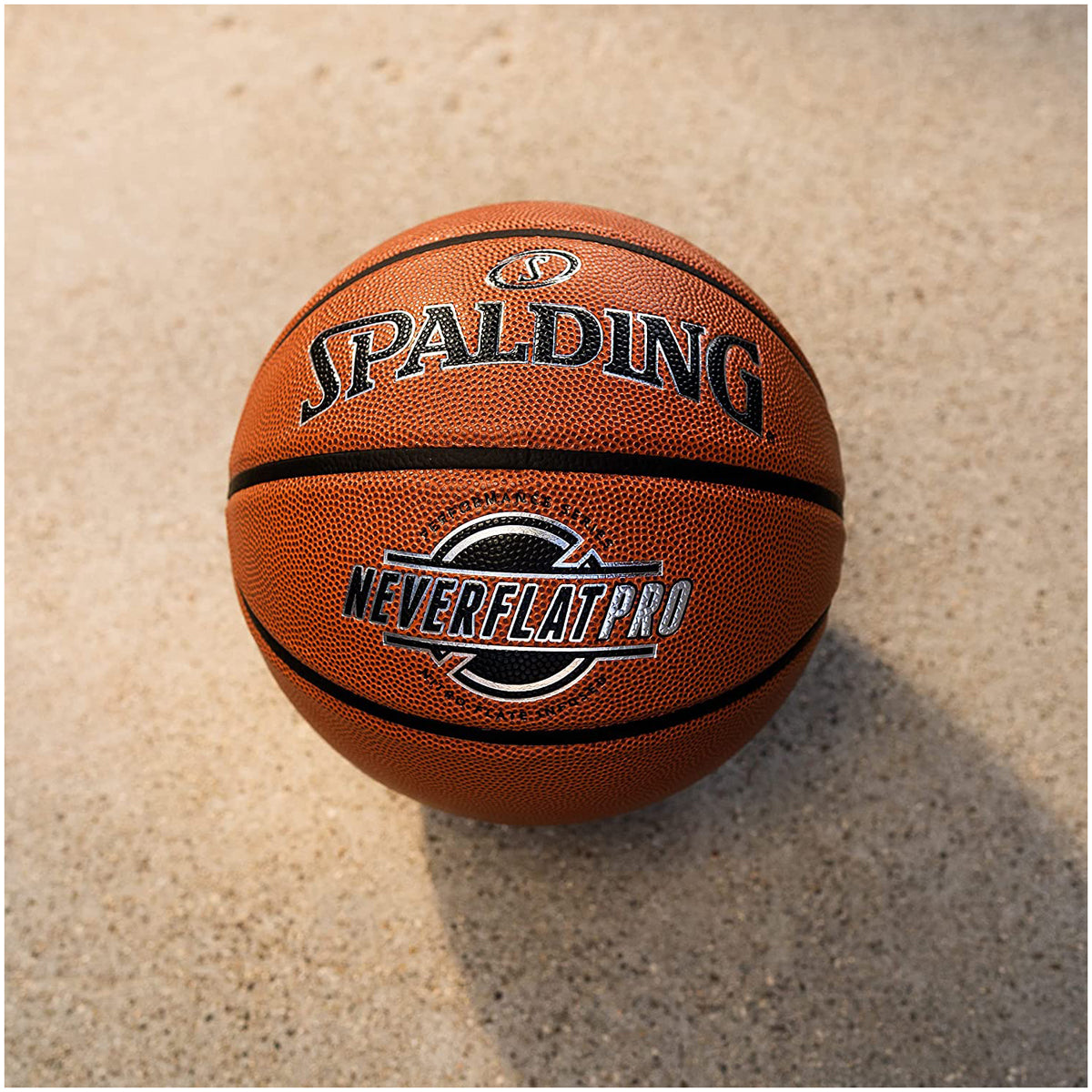 Spalding Neverflat Pro basketball on a textured surface