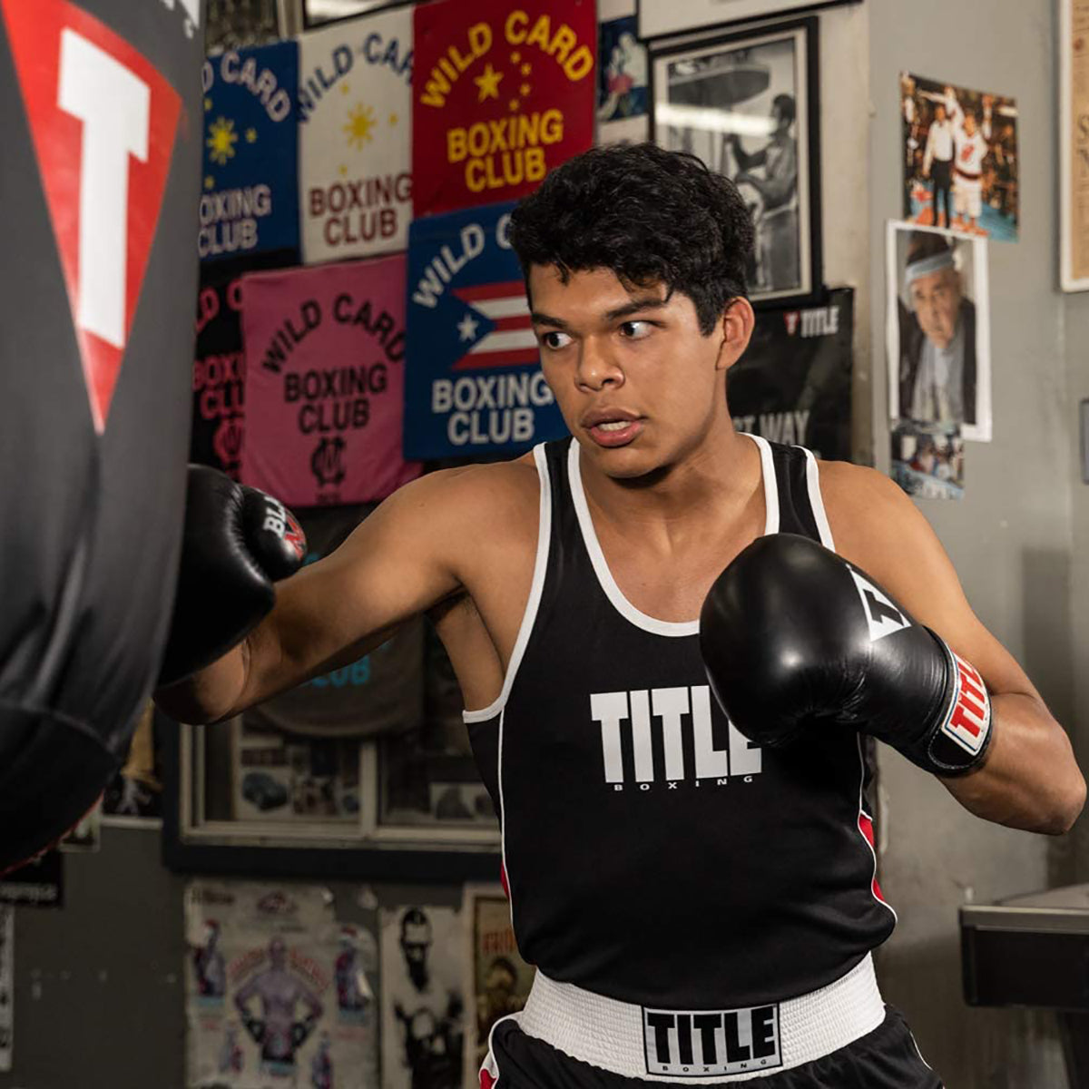 Boxer in training gear with title boxing classic max boxing gloves