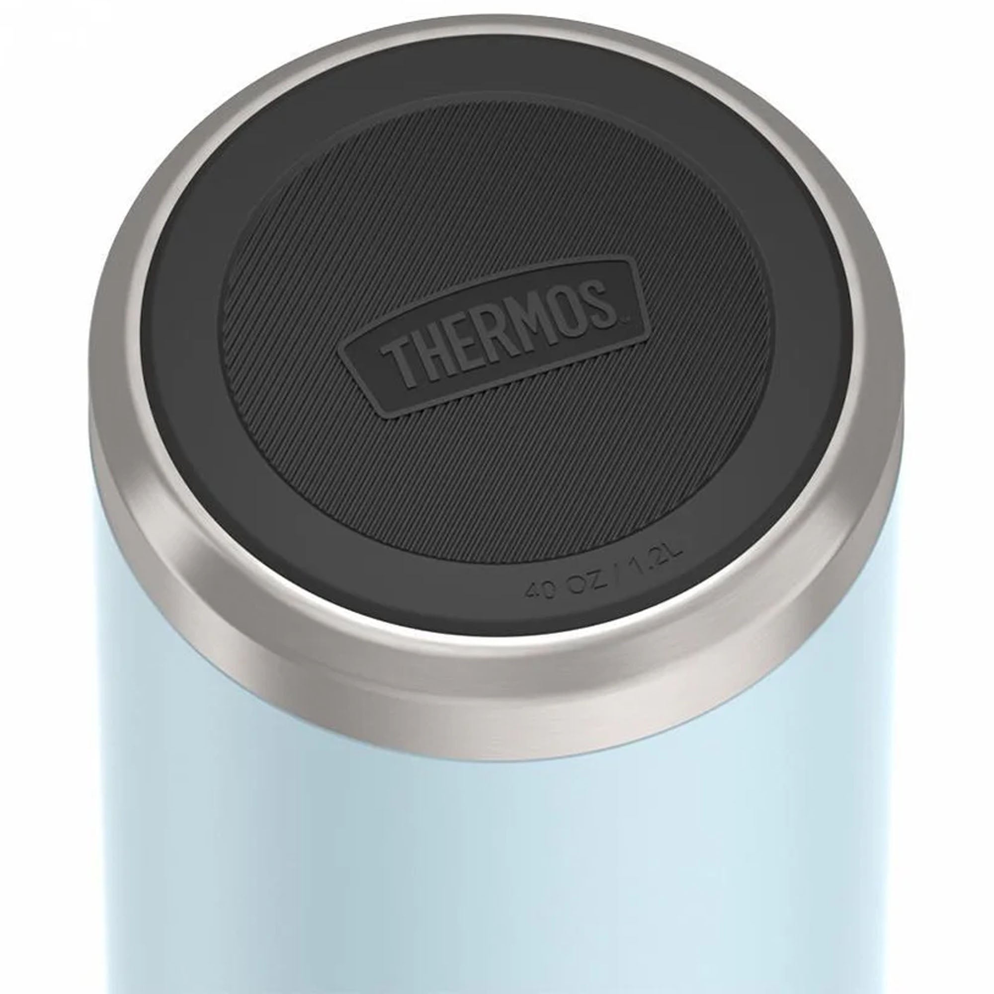Close-up of a Thermos brand lid on a light blue container with a white background