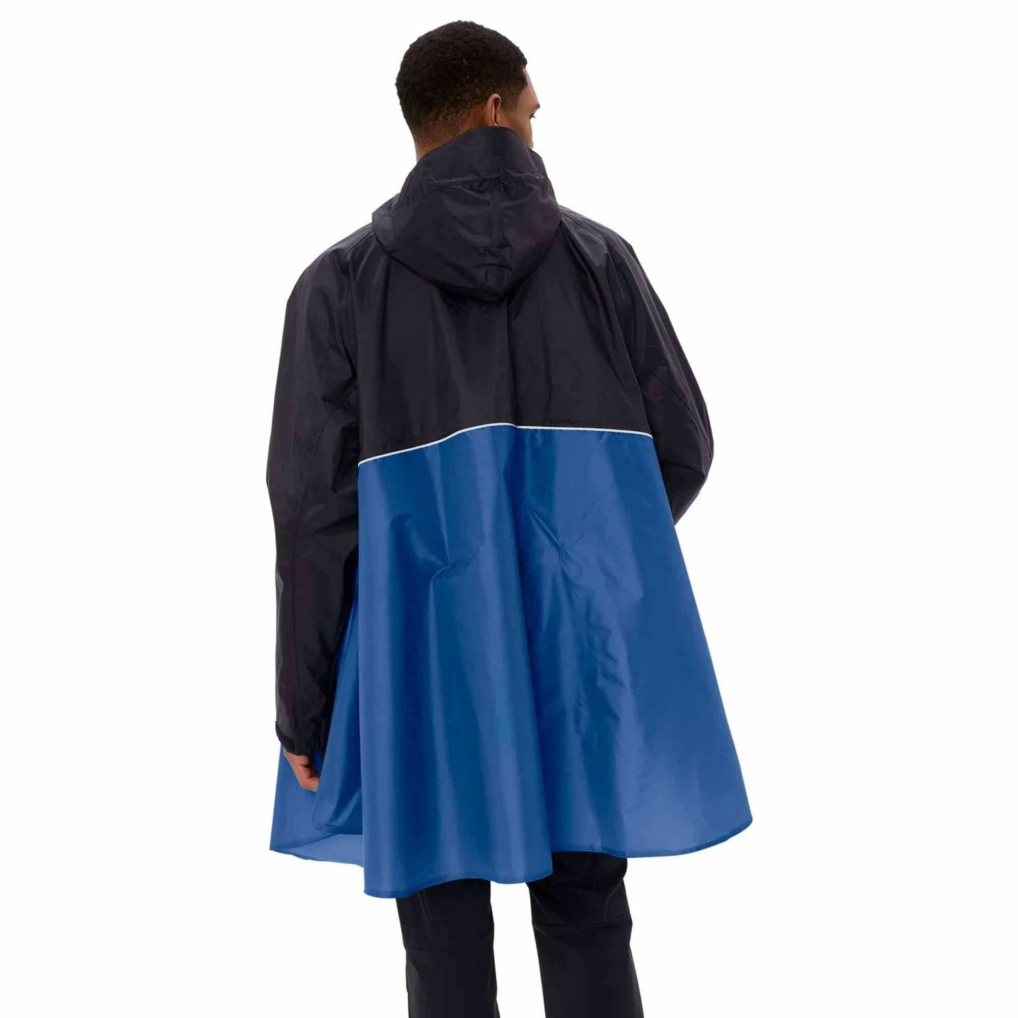 Person wearing a black and blue biking rain poncho on a white background