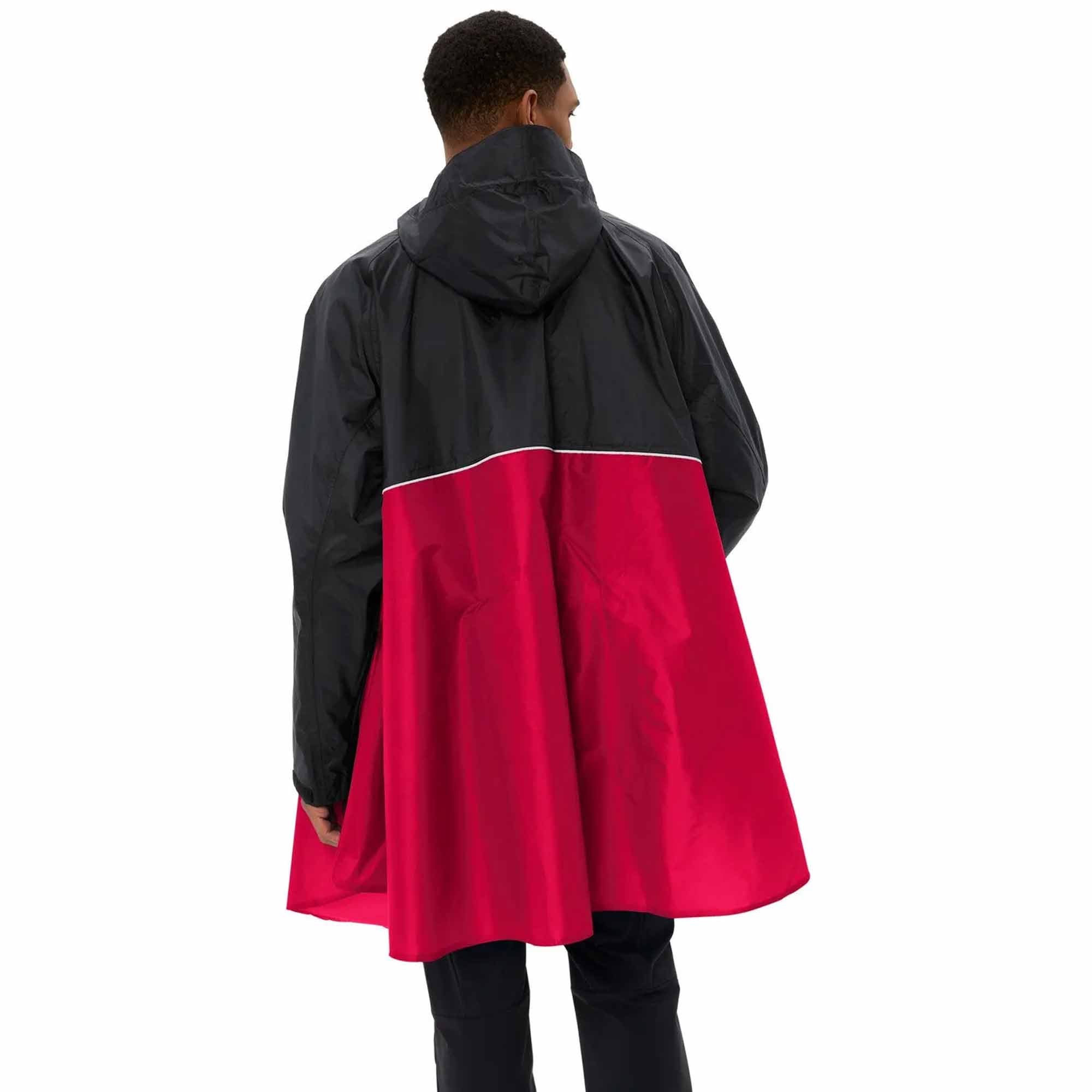 Person wearing a black and red biking rain poncho on a white background