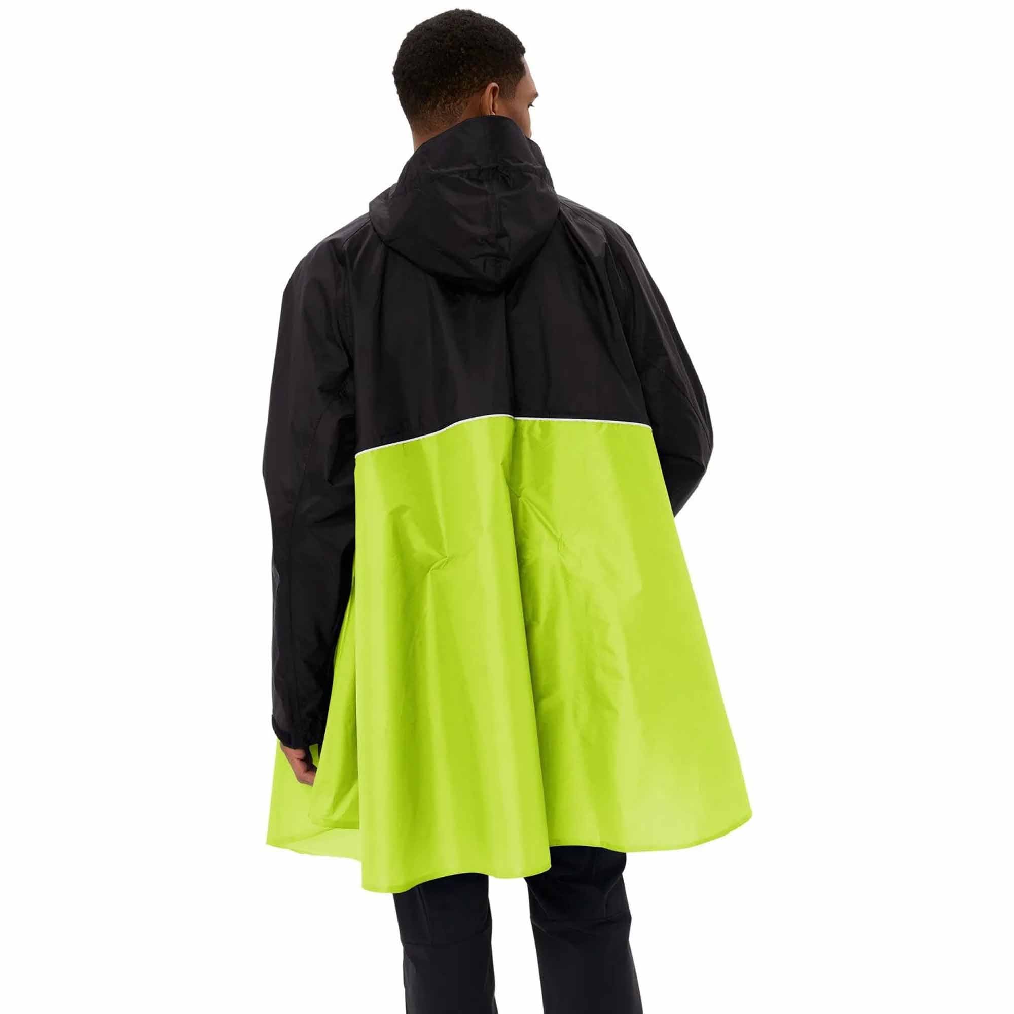 Person wearing a black and yellow biking rain poncho on a white background