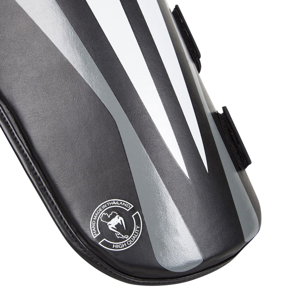 Venum Elite Skintex Leather Leg Protectors - Black/Ice/Red - Forza Sports