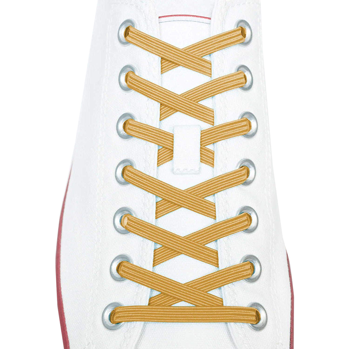 Close-up of a white sneaker with gold laces on a white background