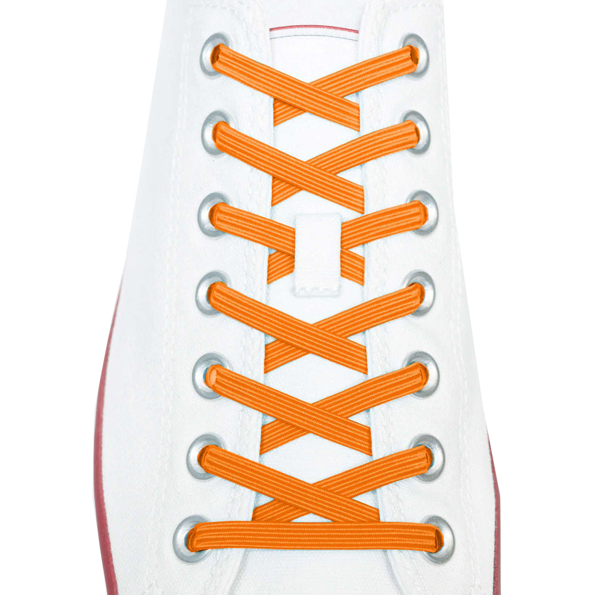 Close-up of orange shoelaces on a white sneaker with a red sole.