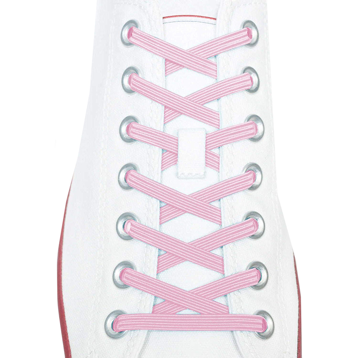 Close-up of pink shoelaces on a white sneaker with a light gray background
