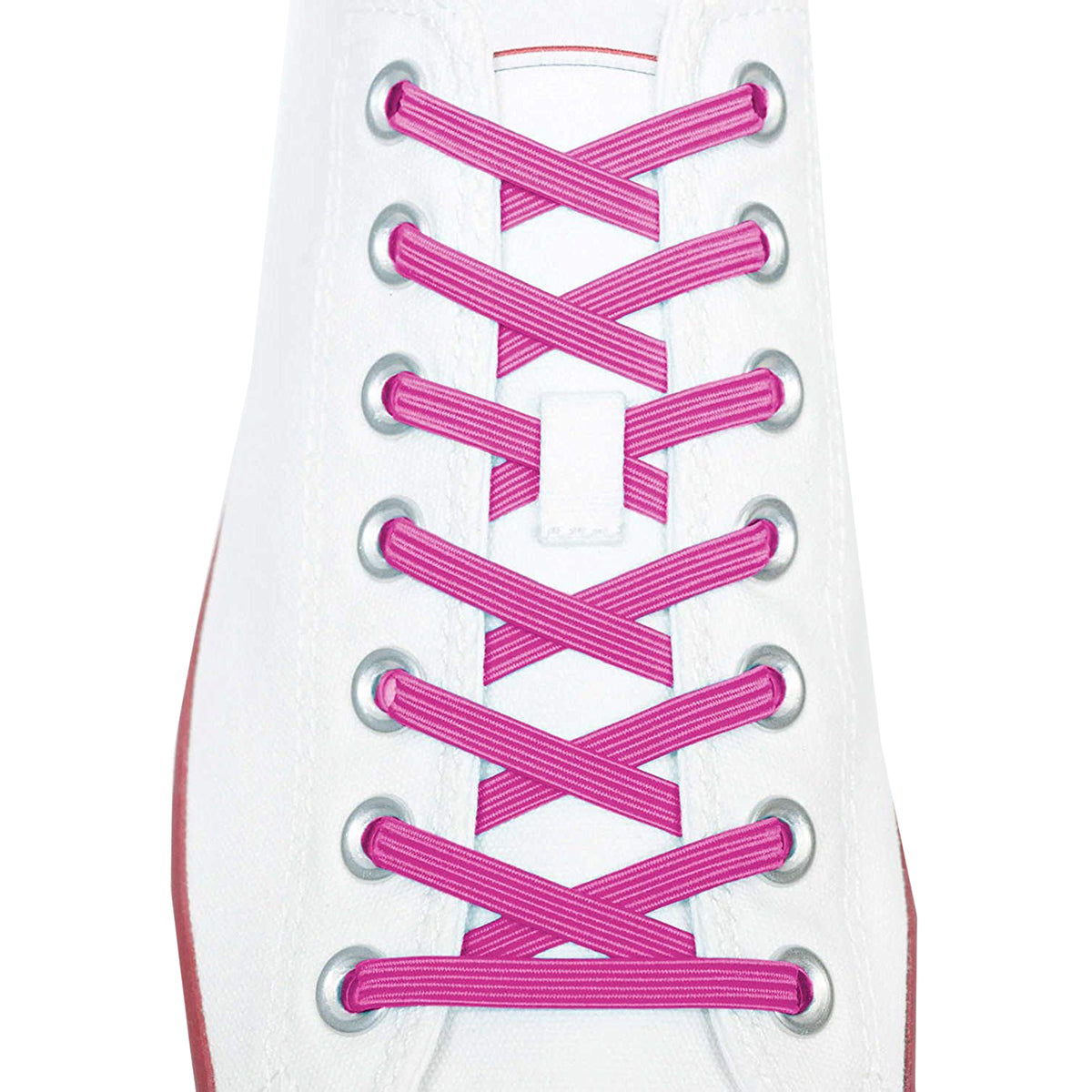 Close-up of a white sneaker with pink shoelaces on a white background