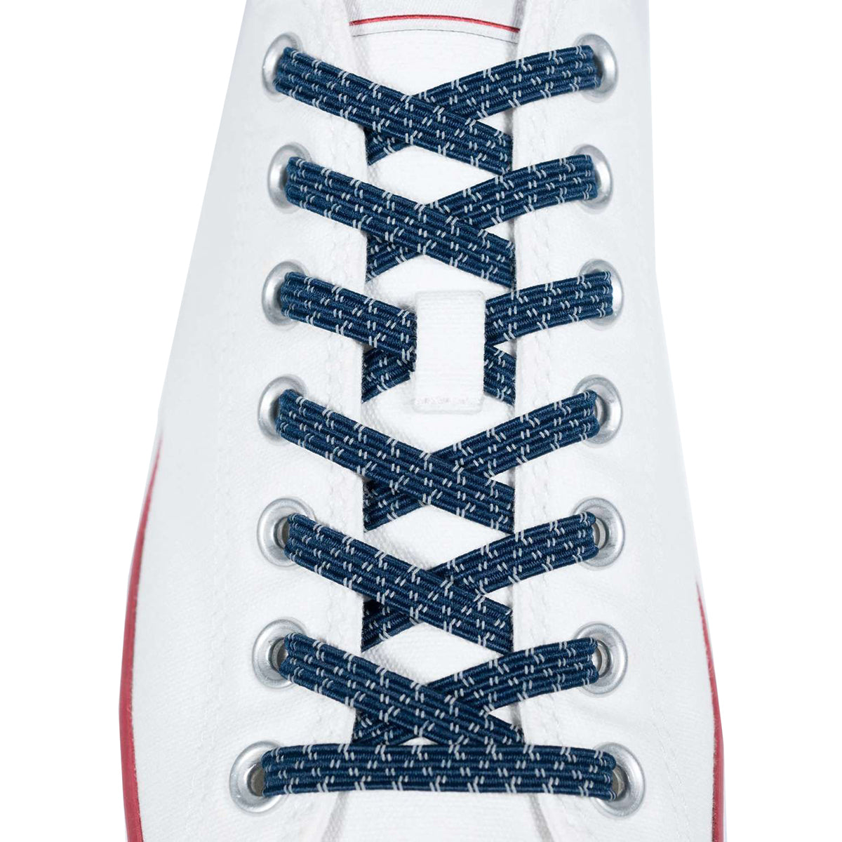 Close-up of a white sneaker with blue laces on a white background