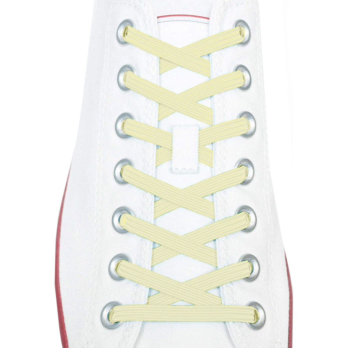 Close-up of a white sneaker with yellow shoelaces on a white background