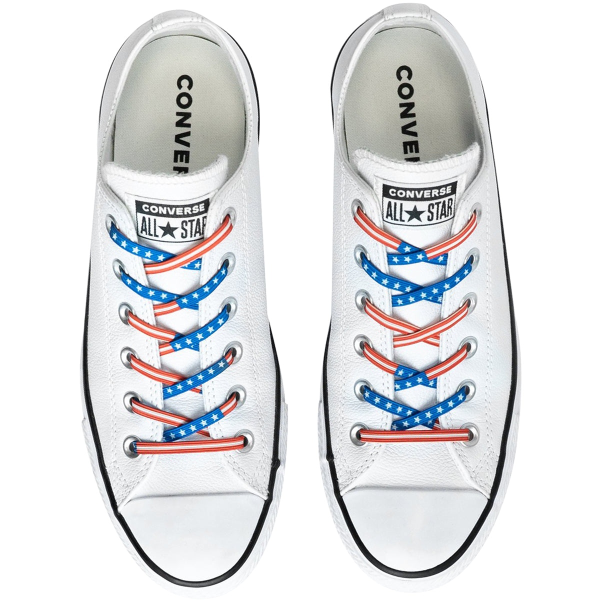White Converse All Star sneakers with red, white, and blue laces on a white background