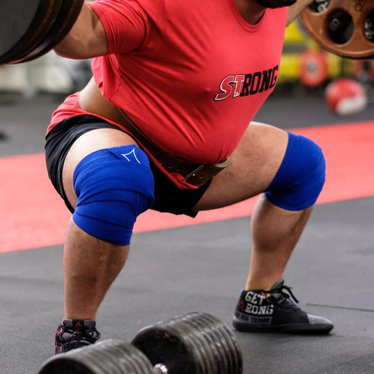 मार्क बेल द्वारा स्लिंग शॉट नी रैप्स - ब्लू स्लिंग शॉट