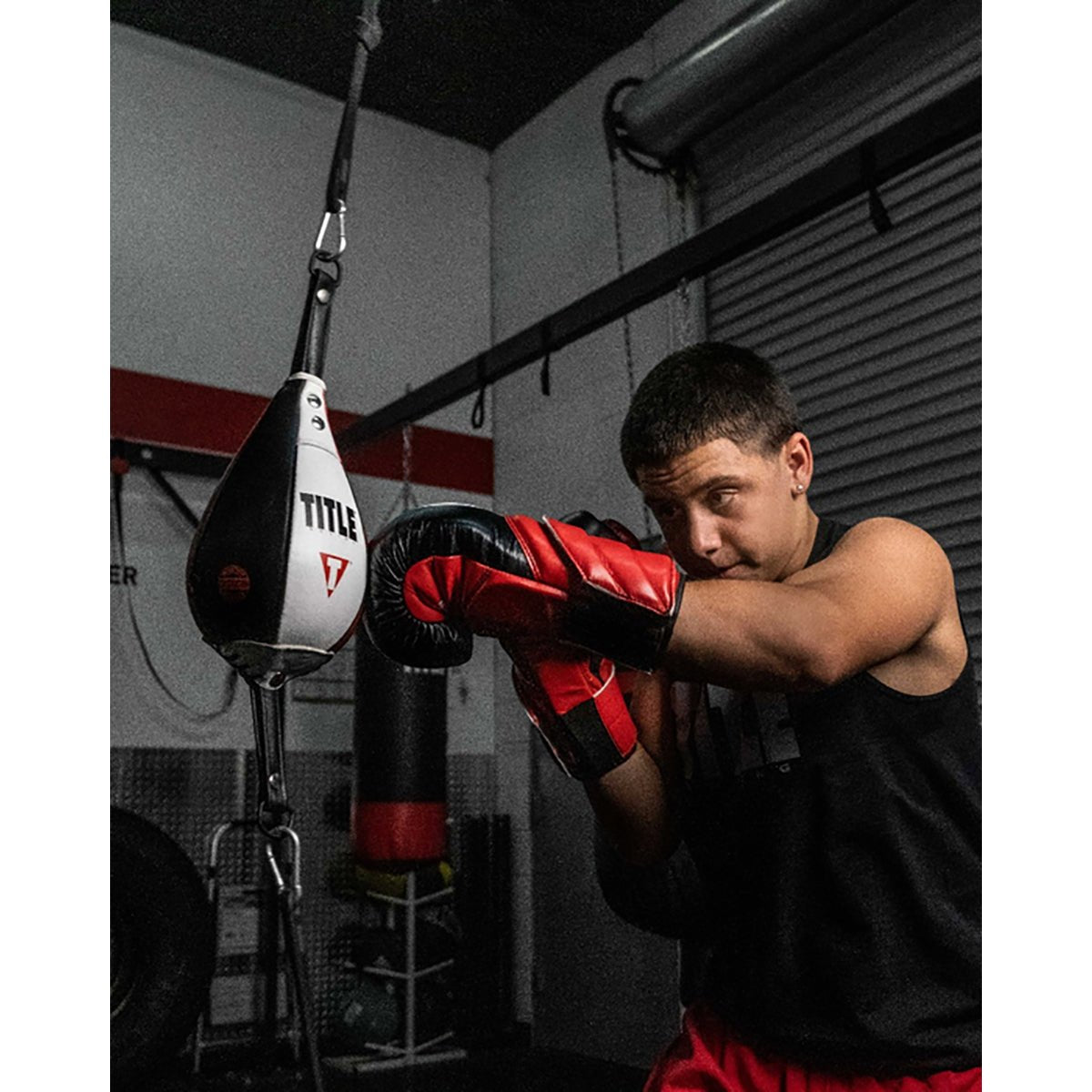 टाइटल बॉक्सिंग मैक्सिकन स्टाइल इन्फ्यूज्ड फोम डबल एंड बैग - साइज़ 6 - काला/सफ़ेद/लाल - फोर्ज़ा स्पोर्ट्स